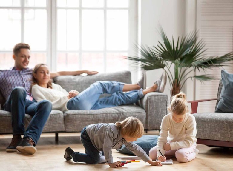 family relaxing in their home with Life Insurance in Galesburg, Burlington, IA, Monmouth, IL, Stronghurst, IL, Oquawka, IL, Biggsville and Surrounding Areas